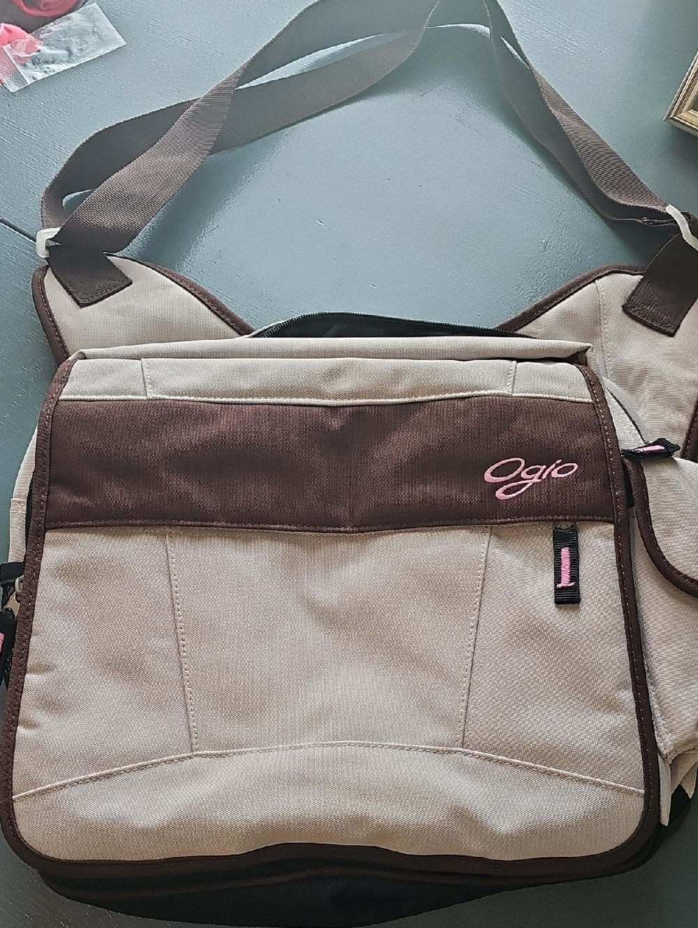 Ogio Beige/ Brown Messenger Bag/ Pink Logo. Good Clean Condition crossbody.